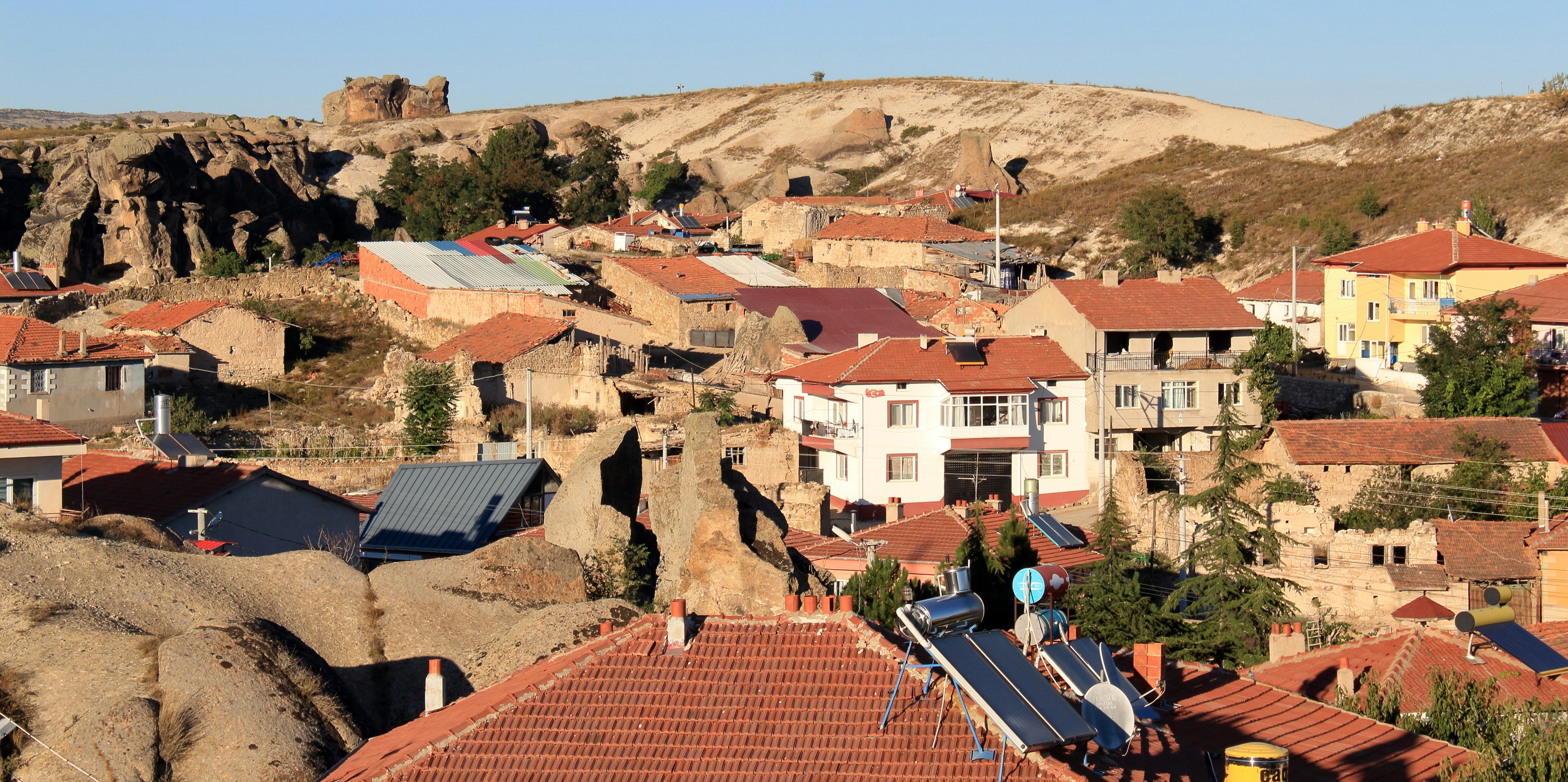 a group of buildings in a valley