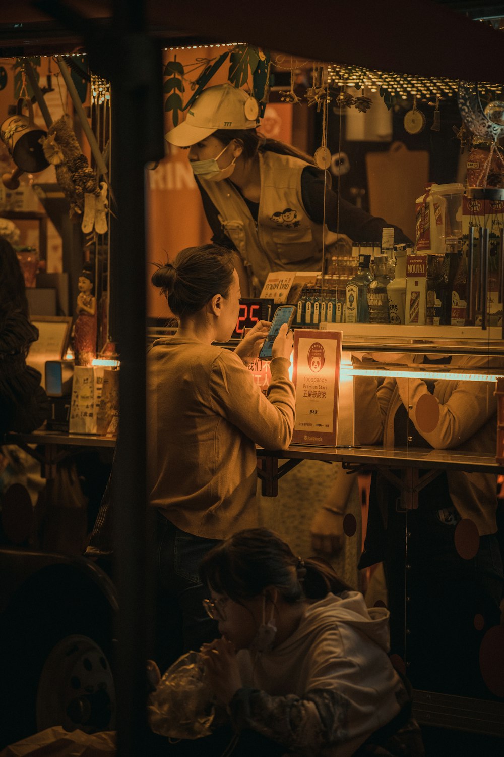 a woman looking at a man in a hat