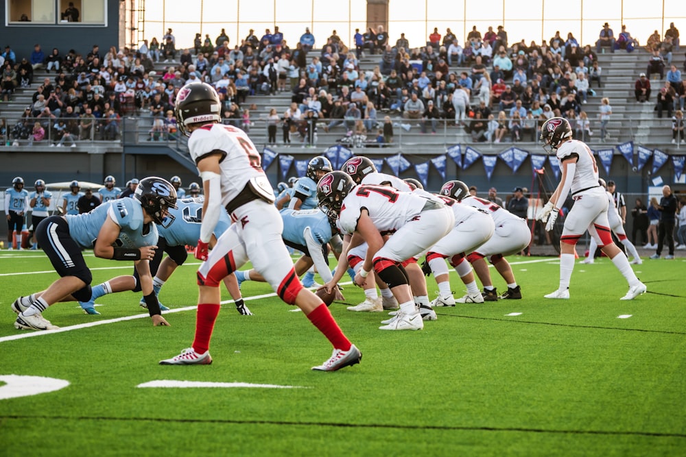 a group of people playing football