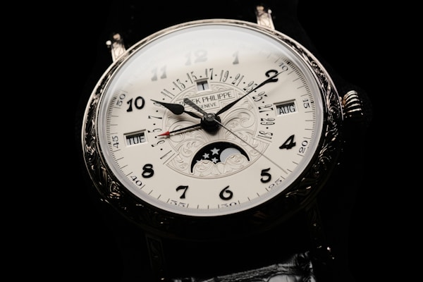 Patek Philippe Grand Complication gold watch with moon phase and perpetual calendar