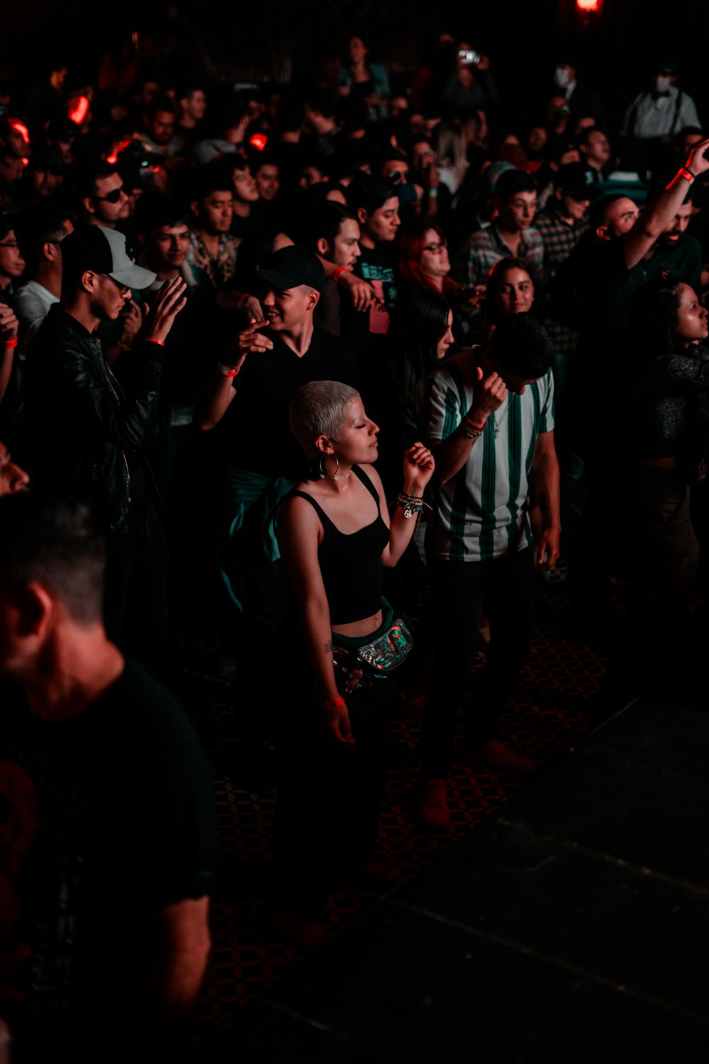 a person dancing in a crowd