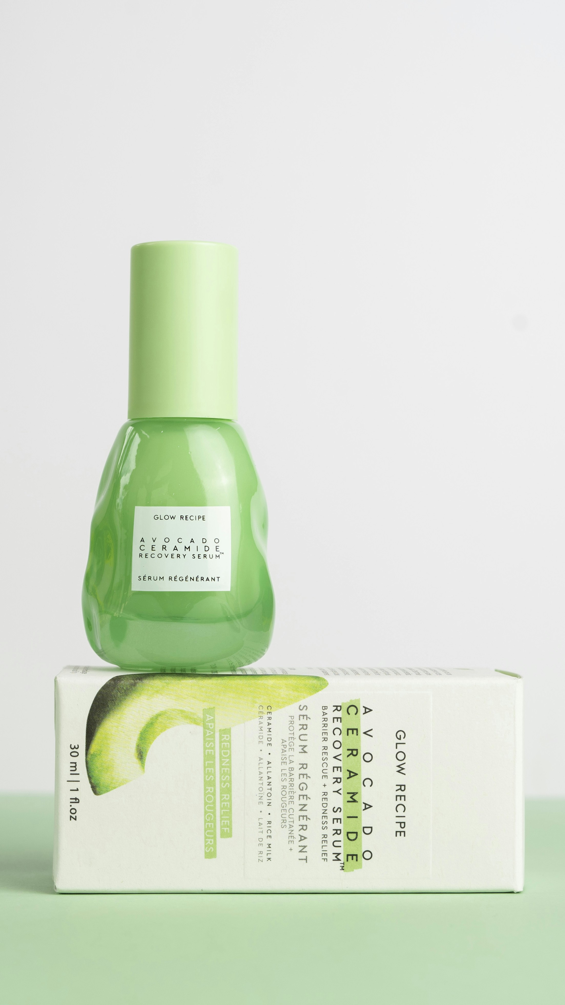 a bottle of green liquid
