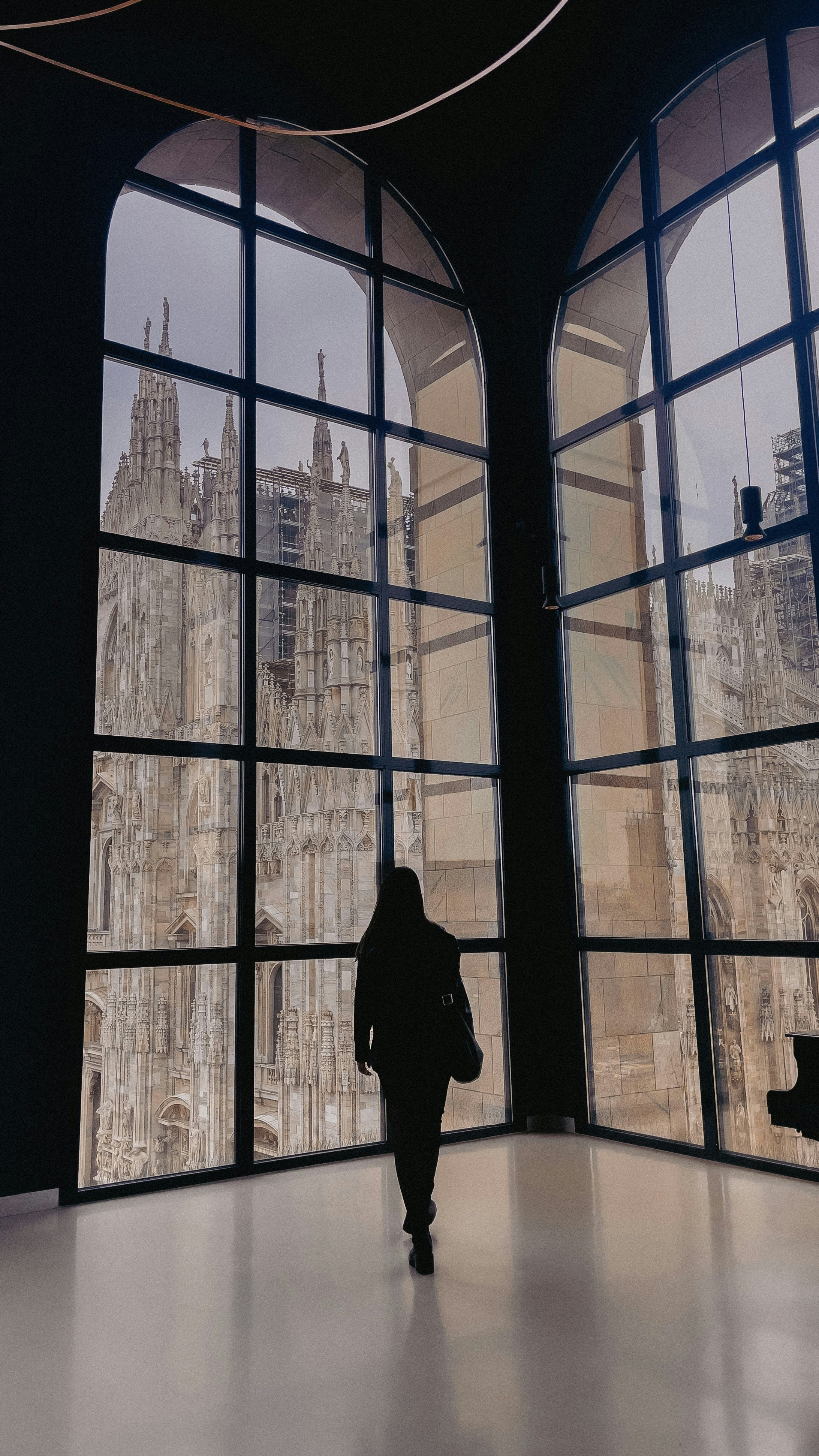 A person walking through a window photo – Free Aesthetic Image on Unsplash