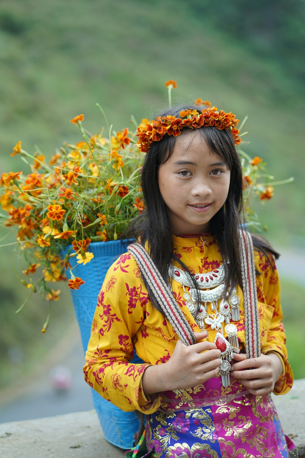 a girl wearing a colorful dress