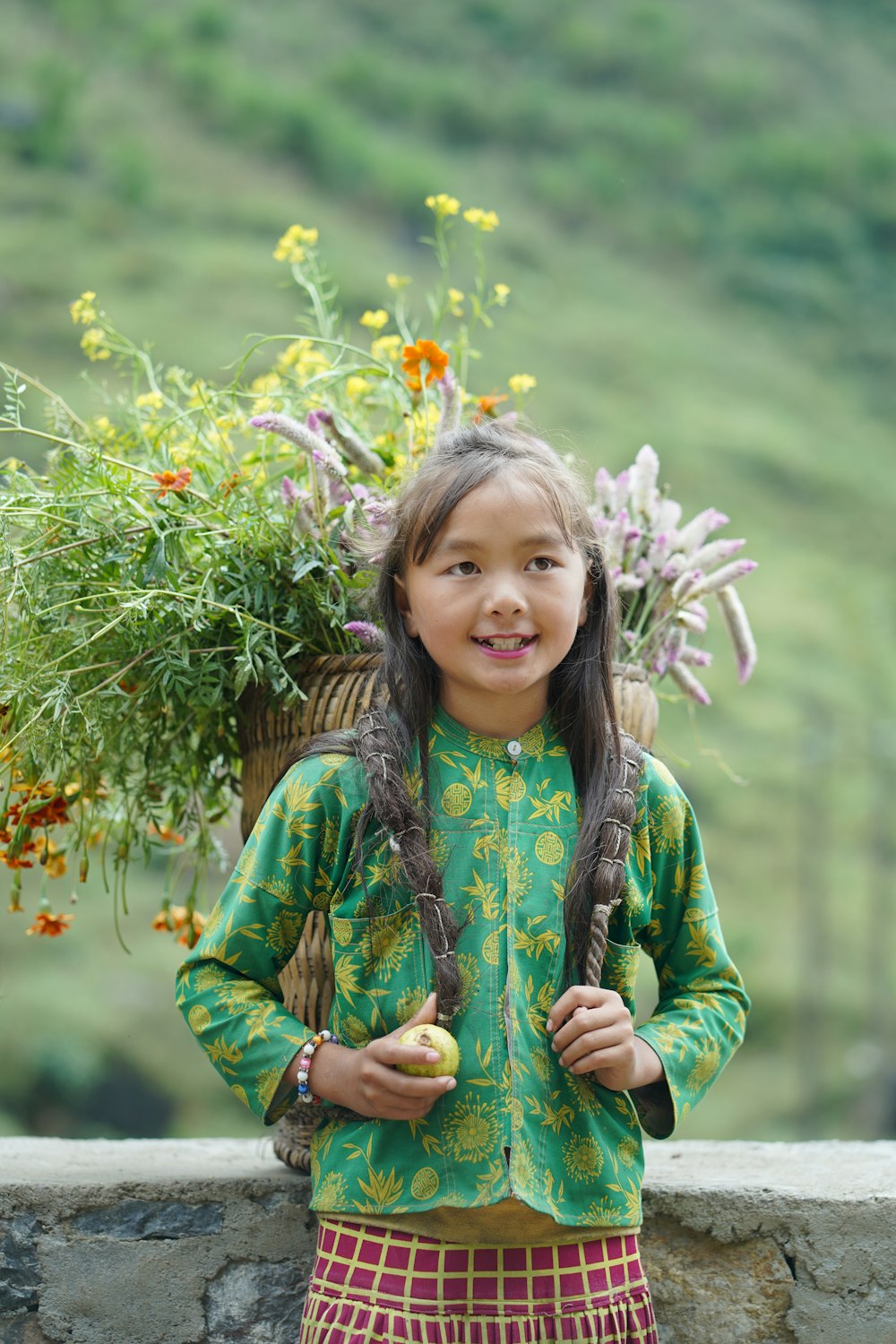 a girl holding flowers