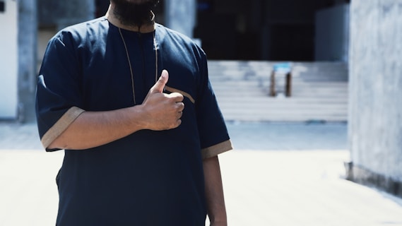 a man wearing a blue shirt