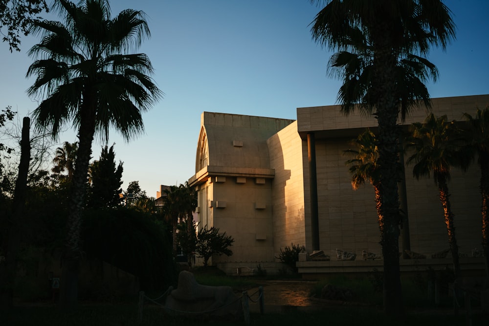 a building with palm trees