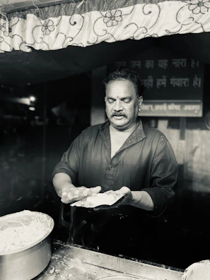 a man holding a piece of paper