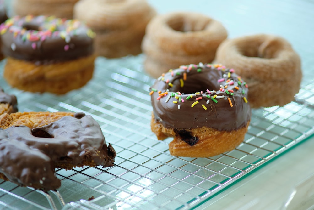 a group of donuts on a metal tray