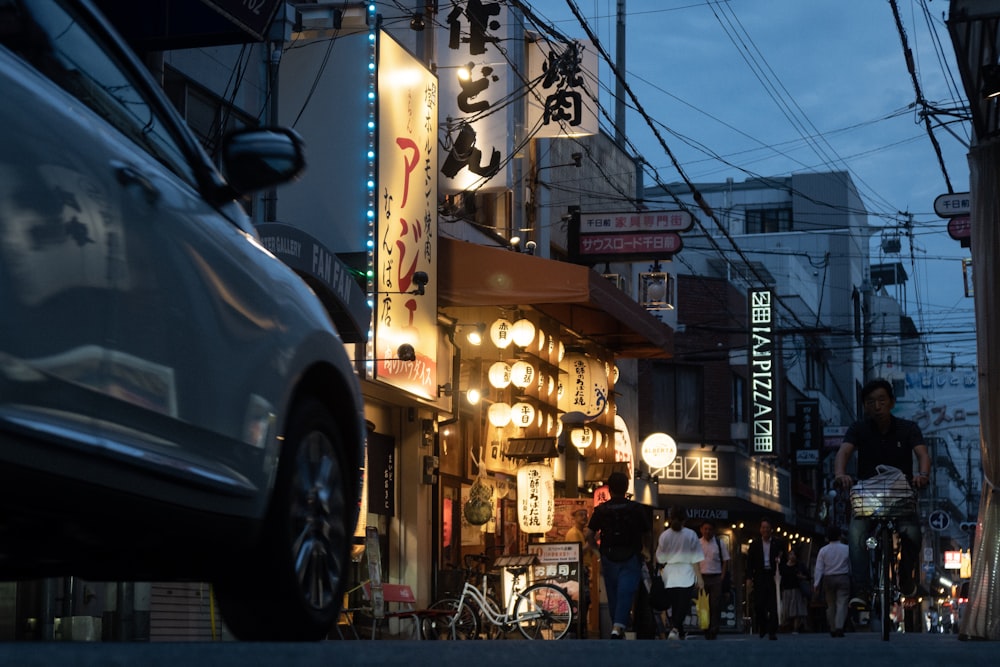 a busy street with people and cars