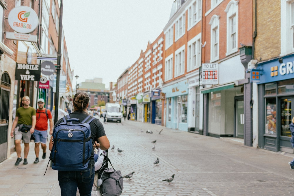 a person walking down a sidewalk