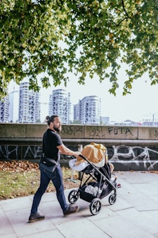 a man pushing a stroller