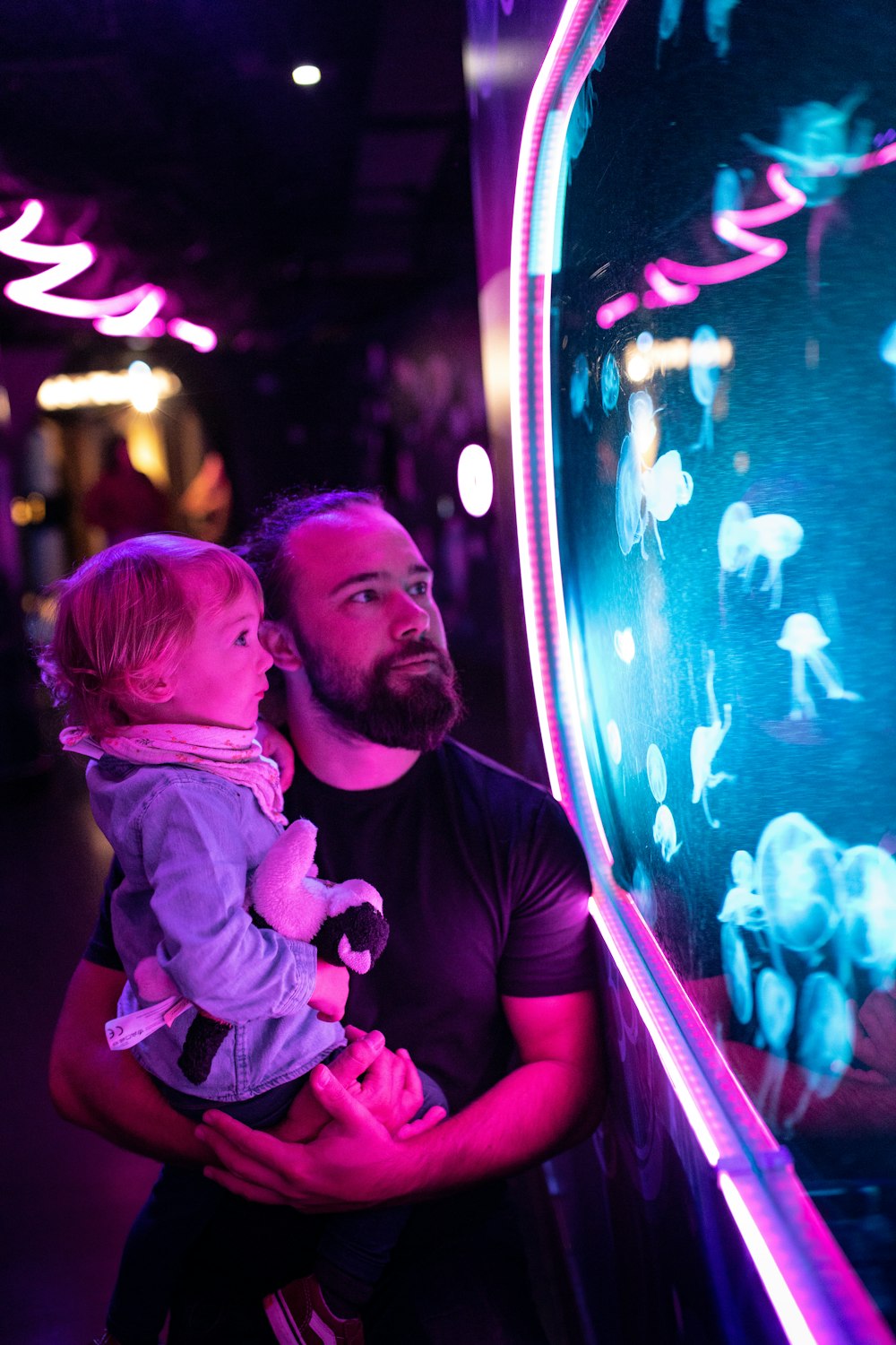 a man holding a baby