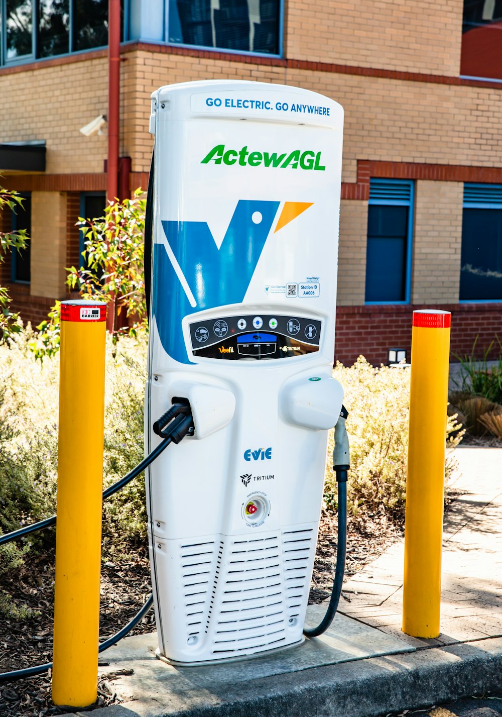 a gas pump on the sidewalk