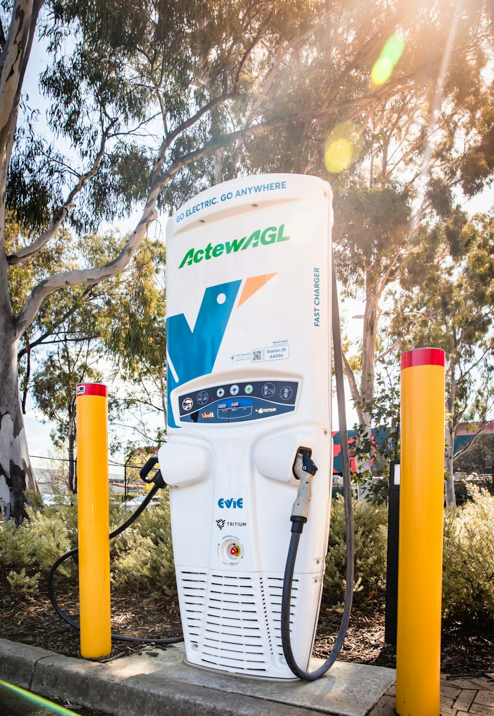 a gas pump on a sidewalk