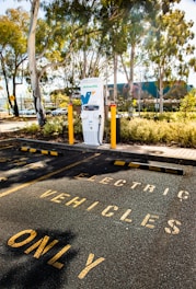 a parking lot with a sign