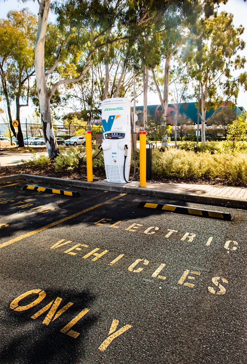 a parking lot with a sign