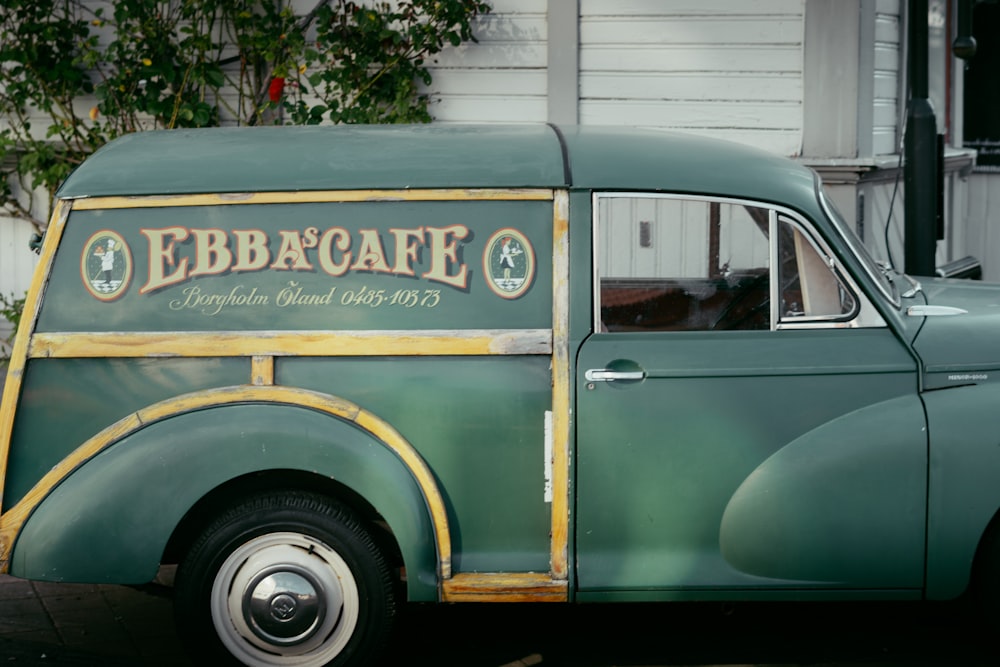 a green van with a sign on it