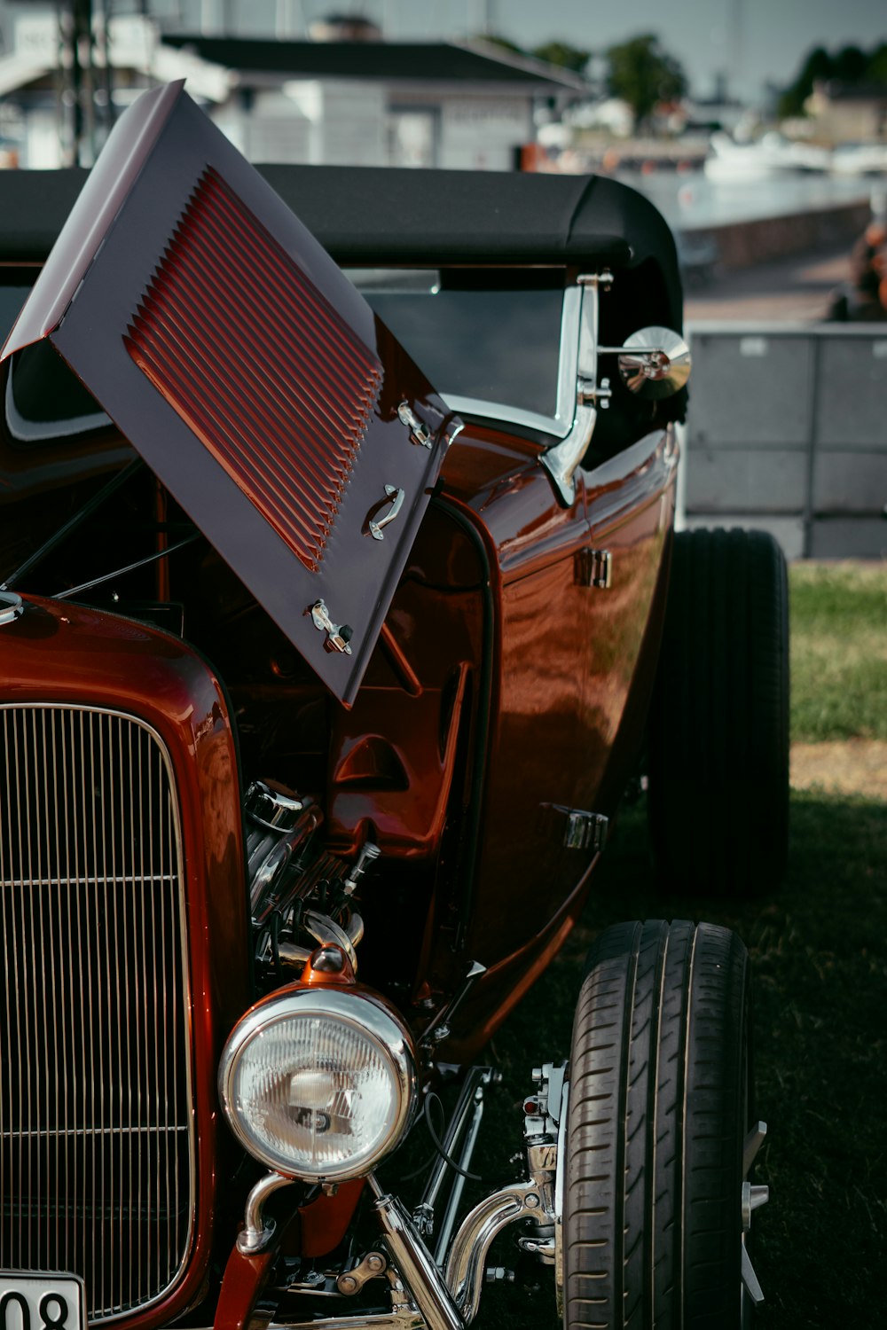 a red tractor with a black top