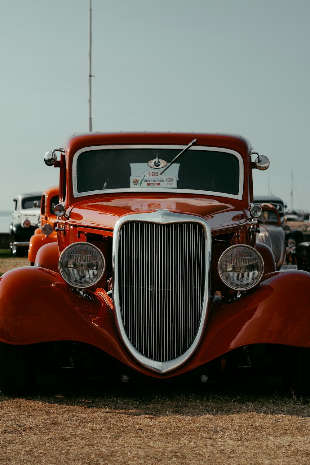 a red car with a logo on it