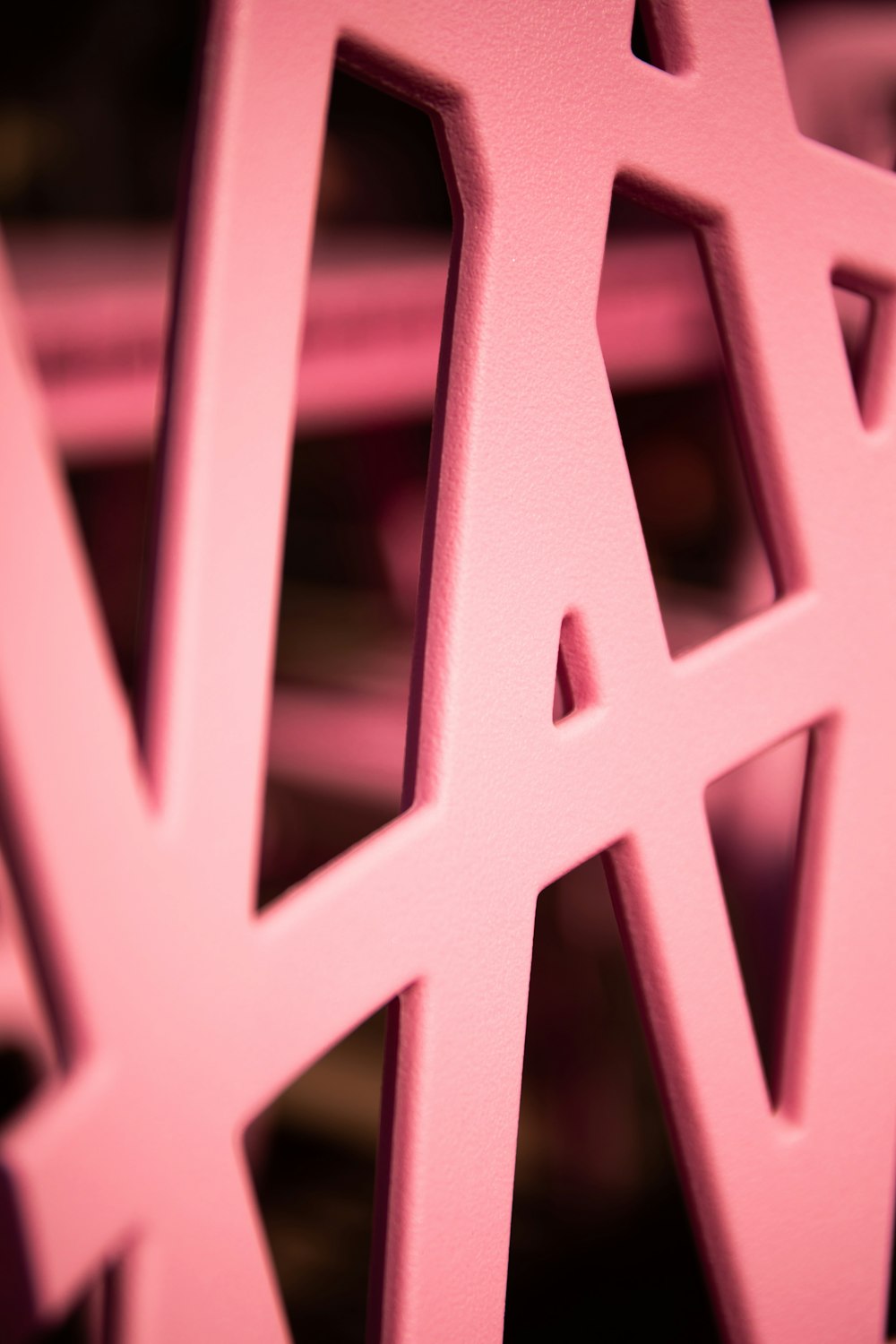 a close up of a pink object