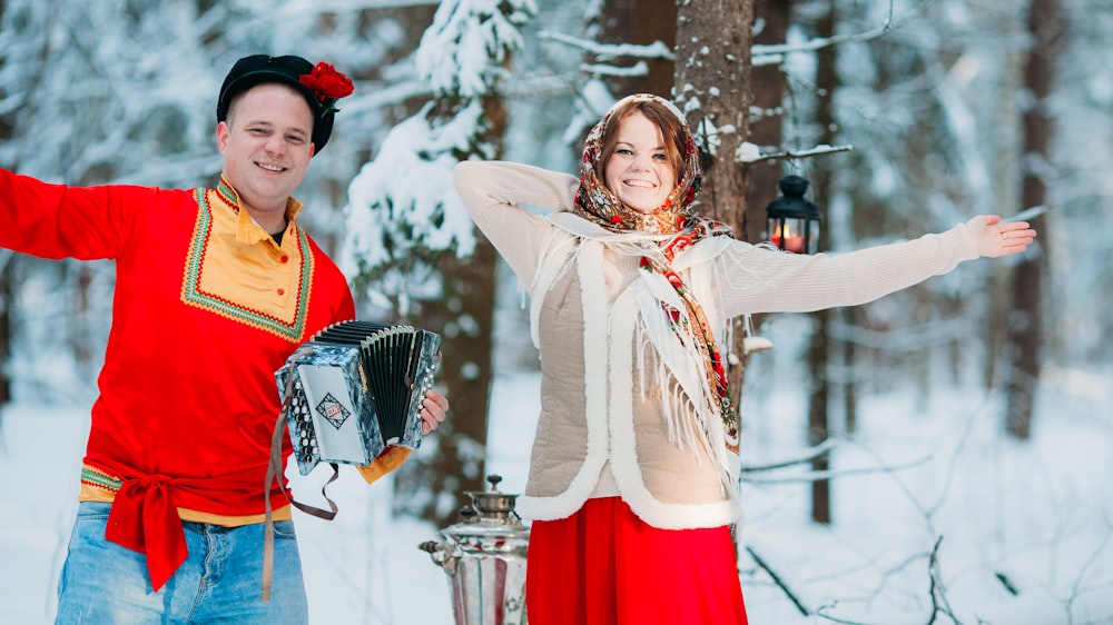 a man and woman in traditional dress