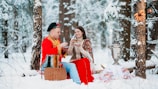 A happy family enjoying a traditional tea ceremony during their trip.