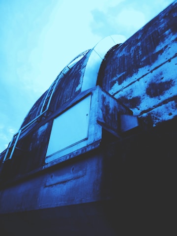 Modern engineering blueprint with dark tones background and structural elements.