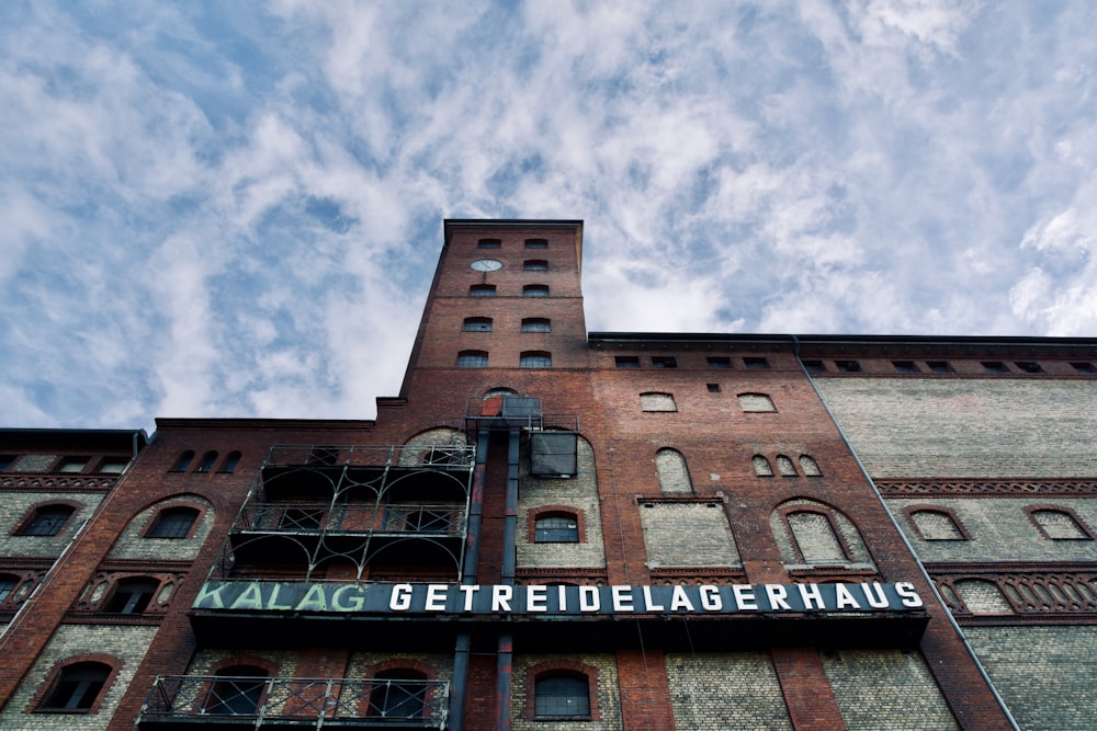 a tall building with a sign on it