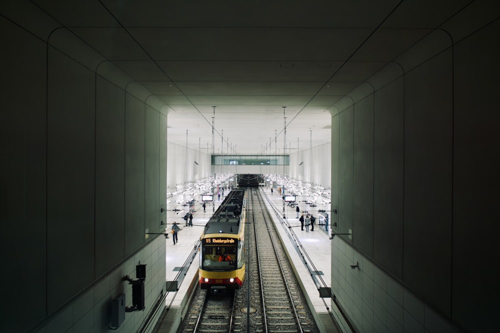 a train travels down the tracks