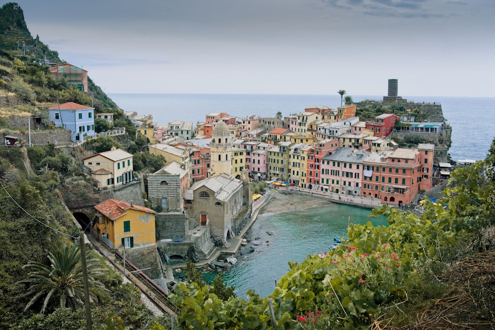 a city with many buildings by the water