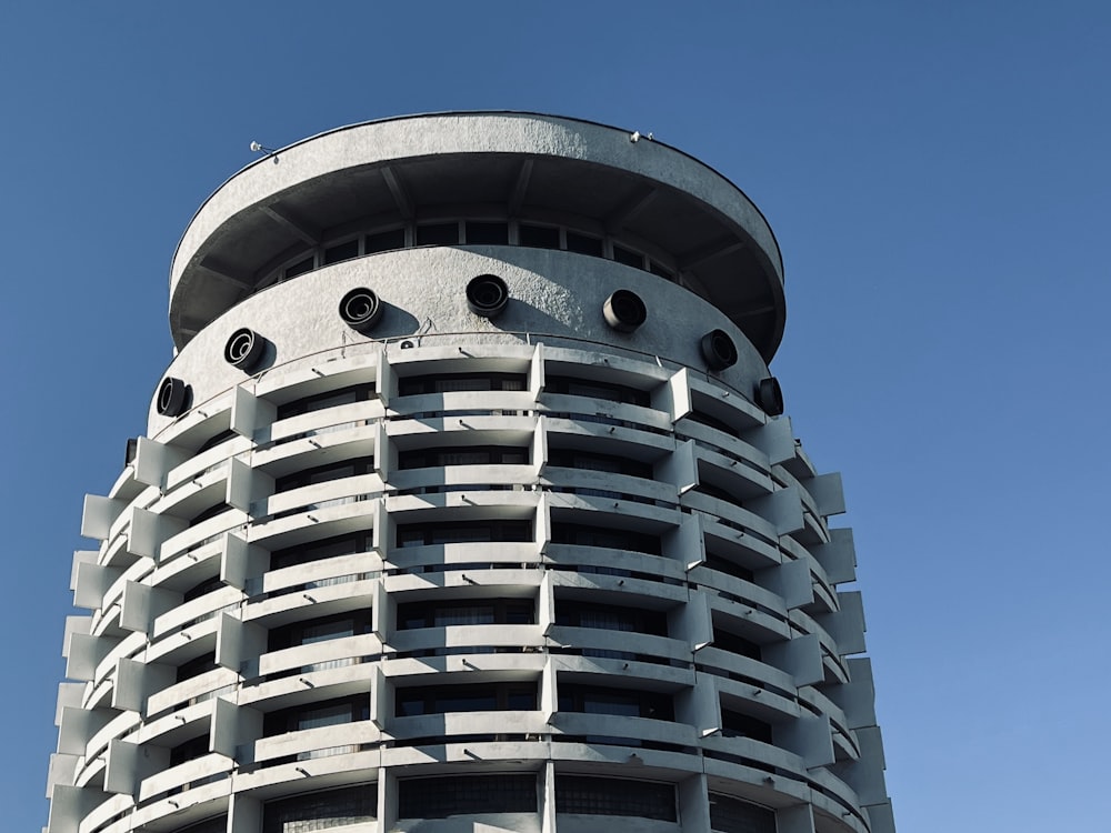 a tall building with a round top