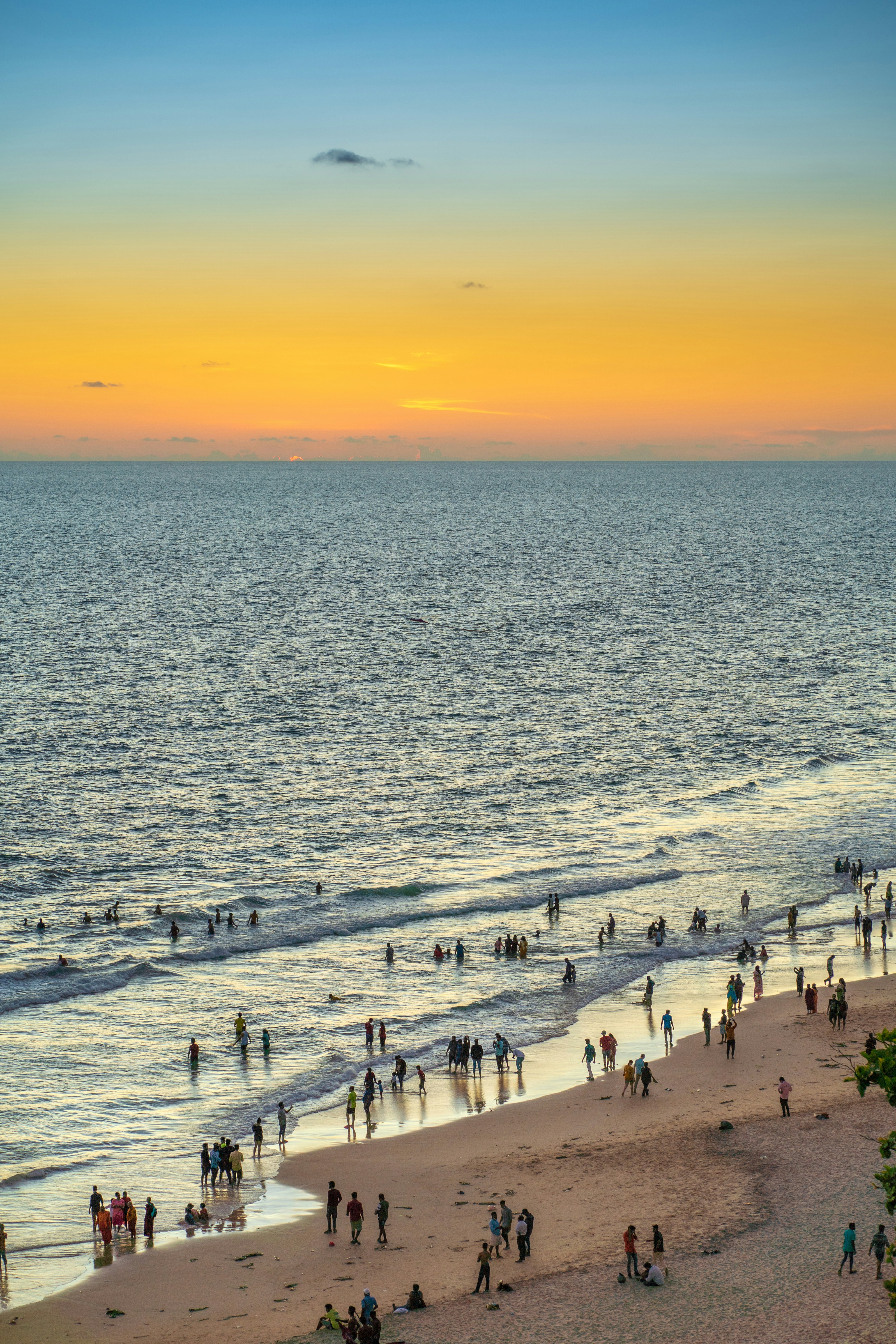 a group of people on a beach