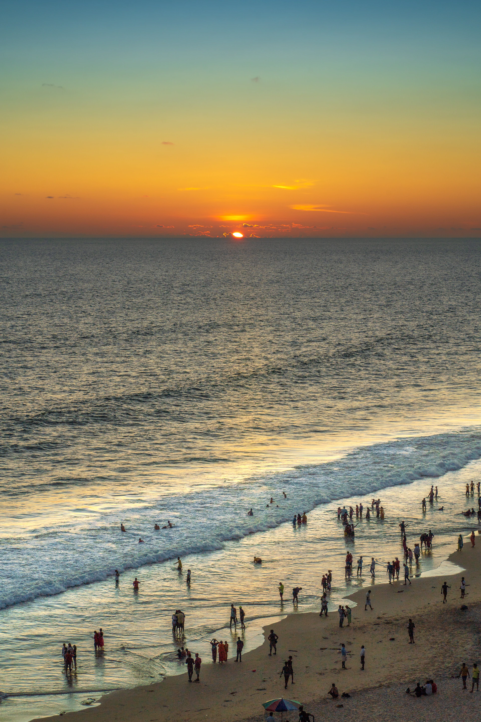a group of people on a beach