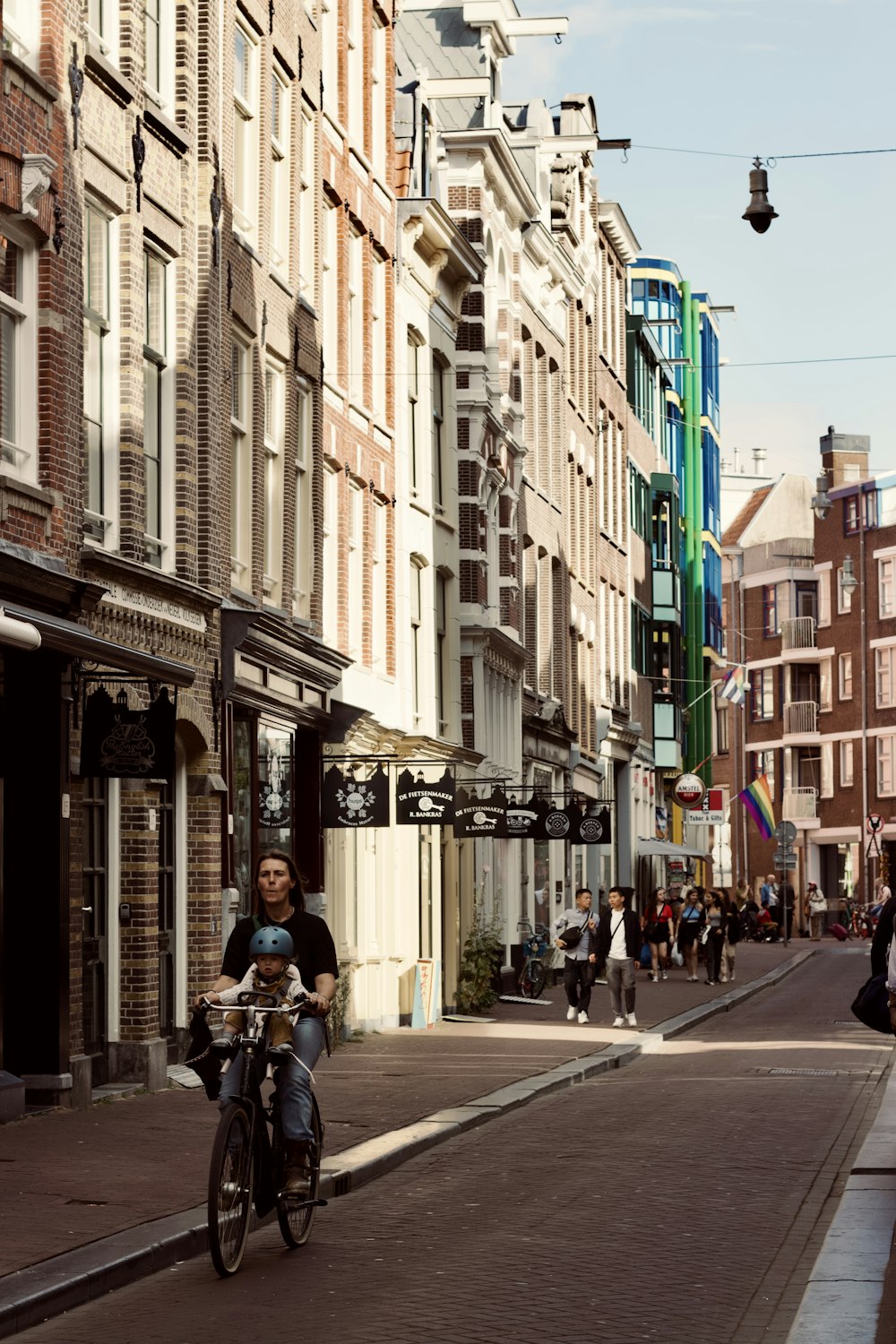 a person riding a bicycle on a city street