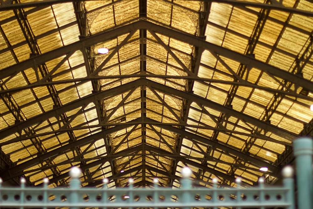 a large group of people in a large room with a large ceiling