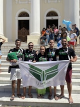 A group photo of Luaz Foundation team collaborating with community partners.