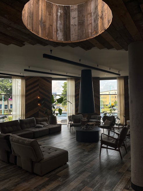 Inviting lounge area featuring plush seating and warm wooden accents