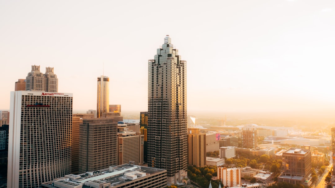 a city with tall buildings, Photo by Lance Asper