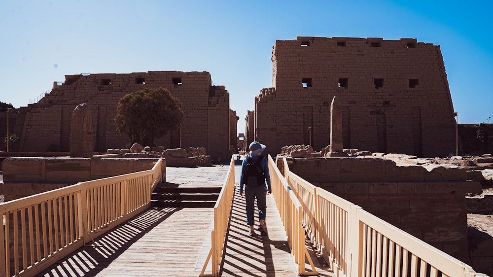 a person walking on a bridge