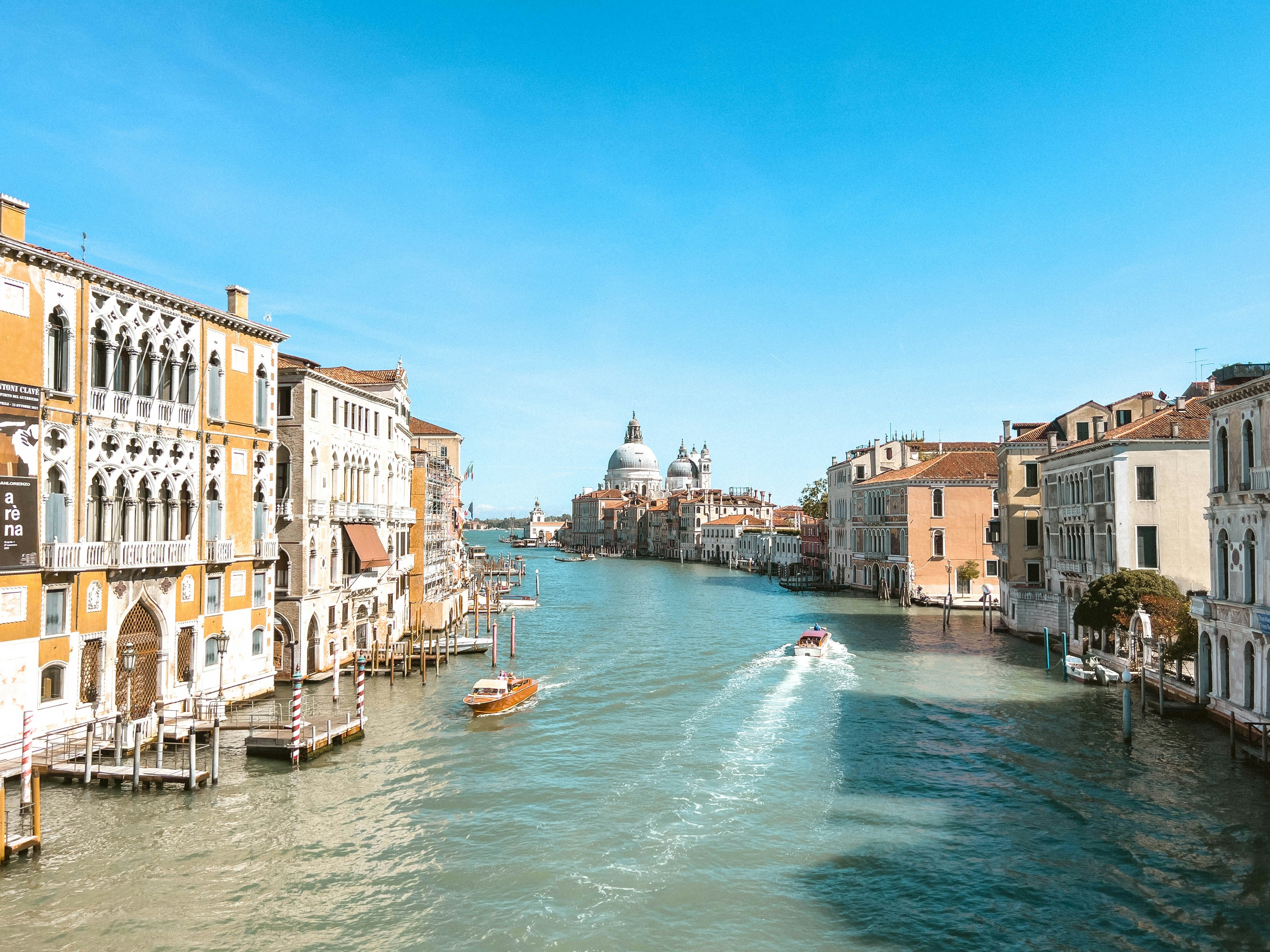 a river with buildings along it with Grand Canal in the background