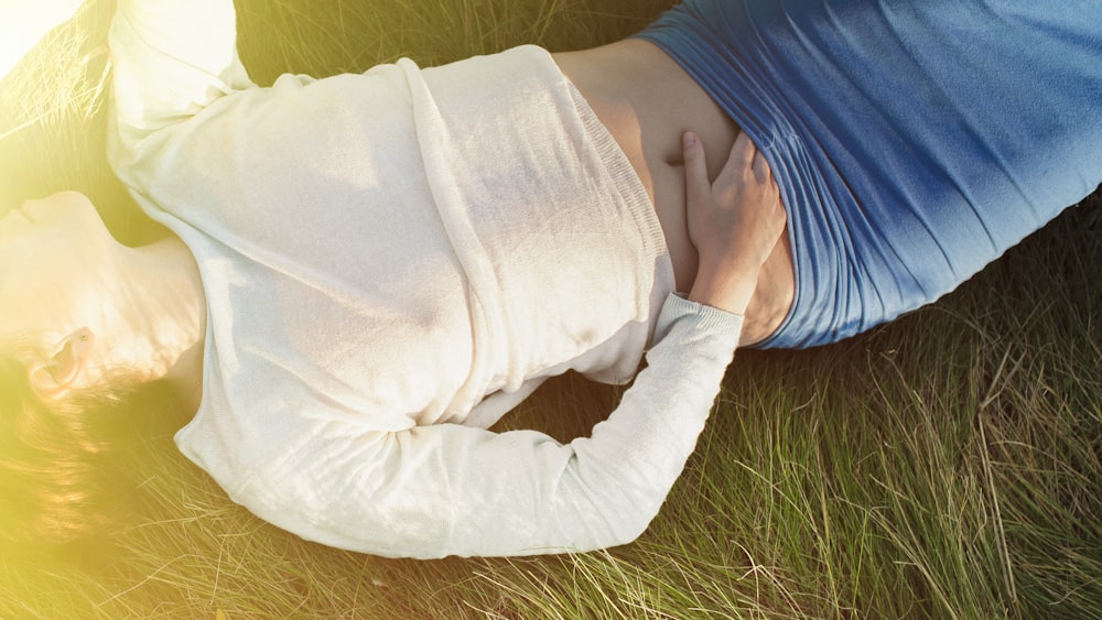 a person lying in a blanket