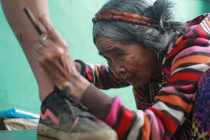 a person holding the head