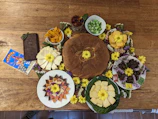 A colourful spread of gluten-free and dairy-free snacks on a rustic table.