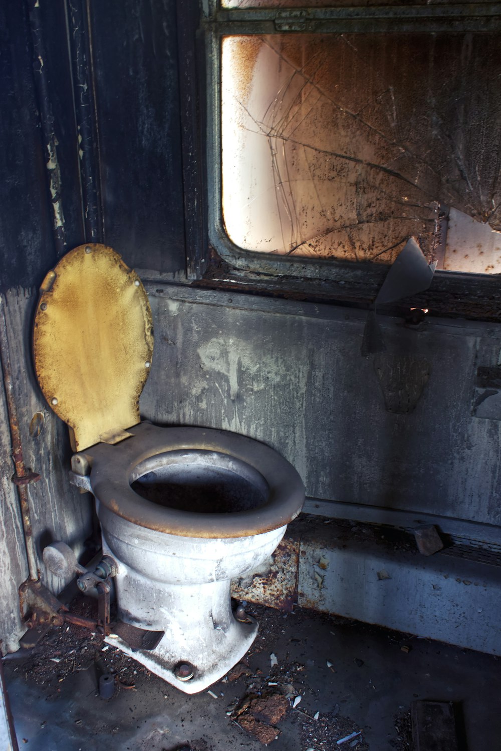 A dirty toilet in a dirty room photo – Free Bathroom Image on Unsplash