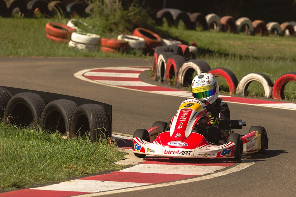 a person driving a go kart