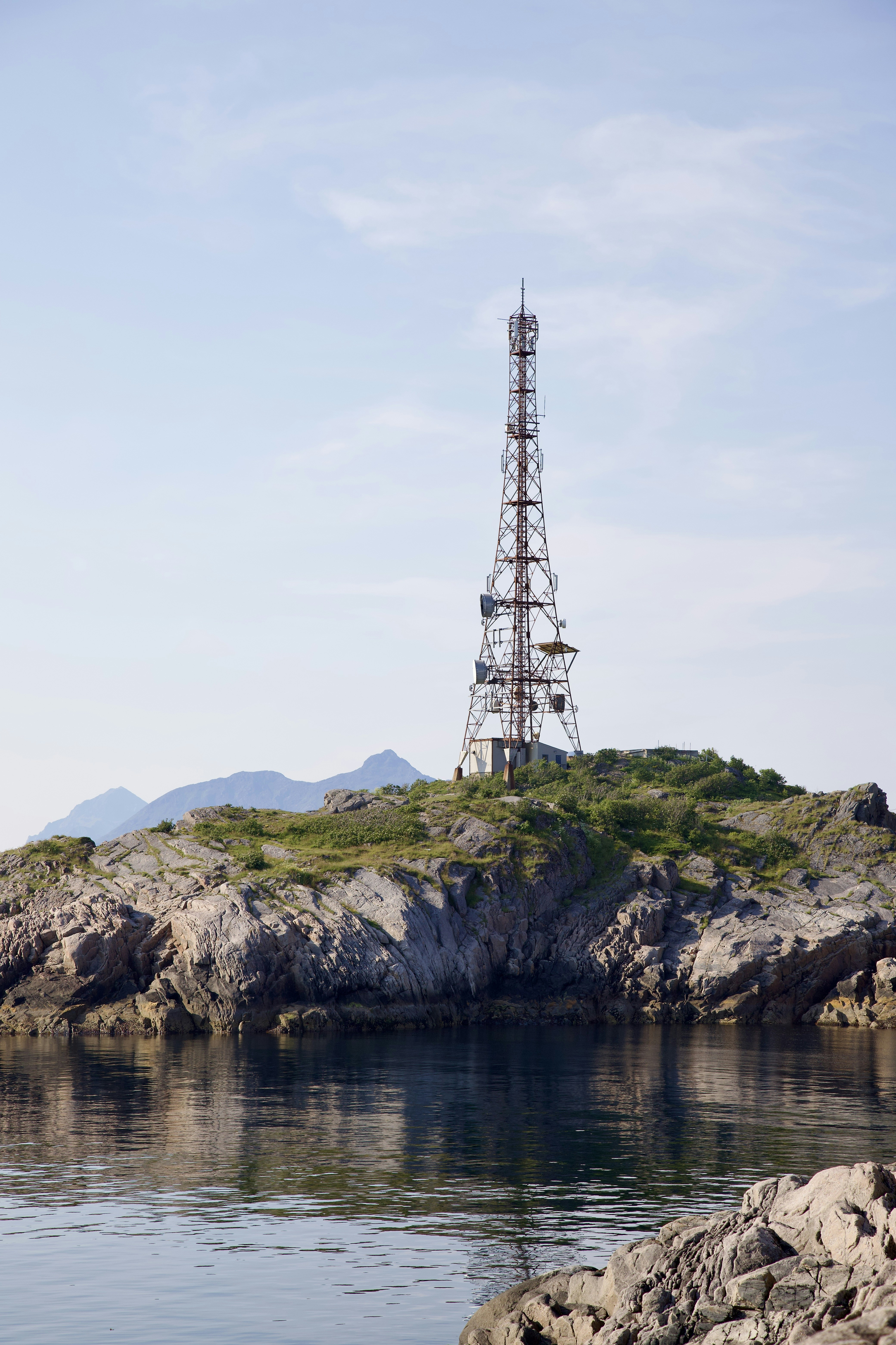 a tower on a rocky hill