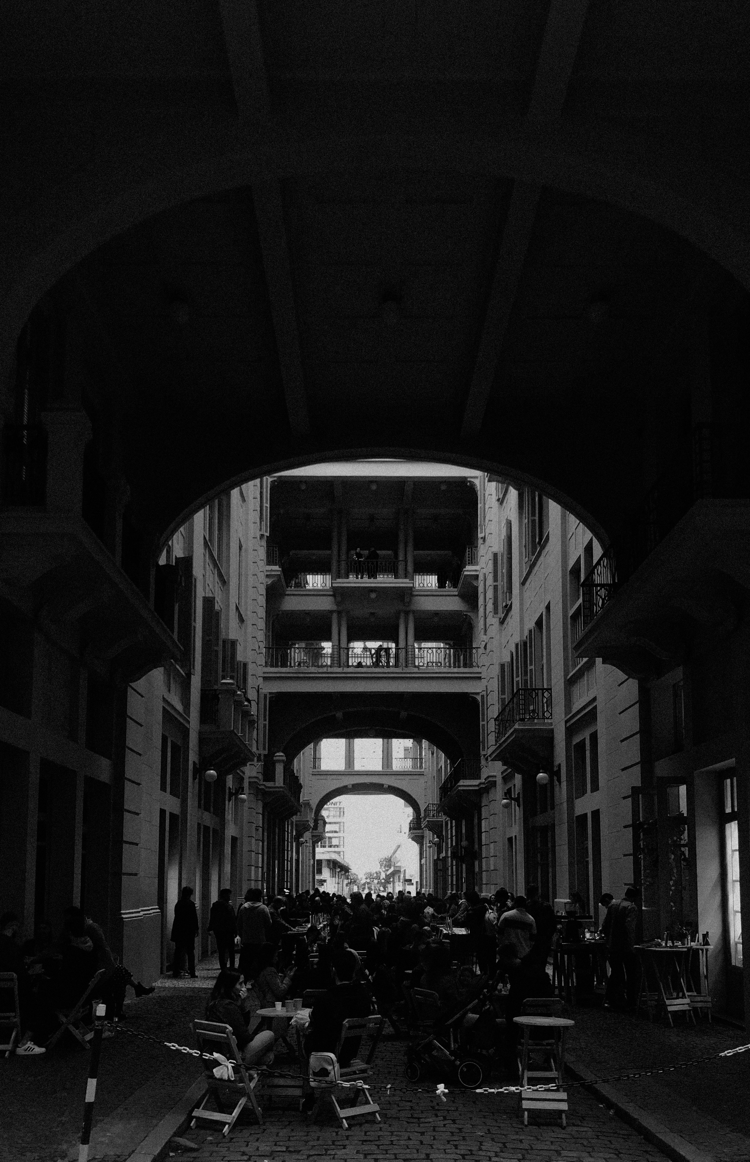 a group of people sitting outside a building