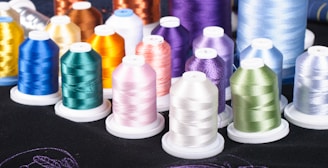 a group of vases are lined up on a table