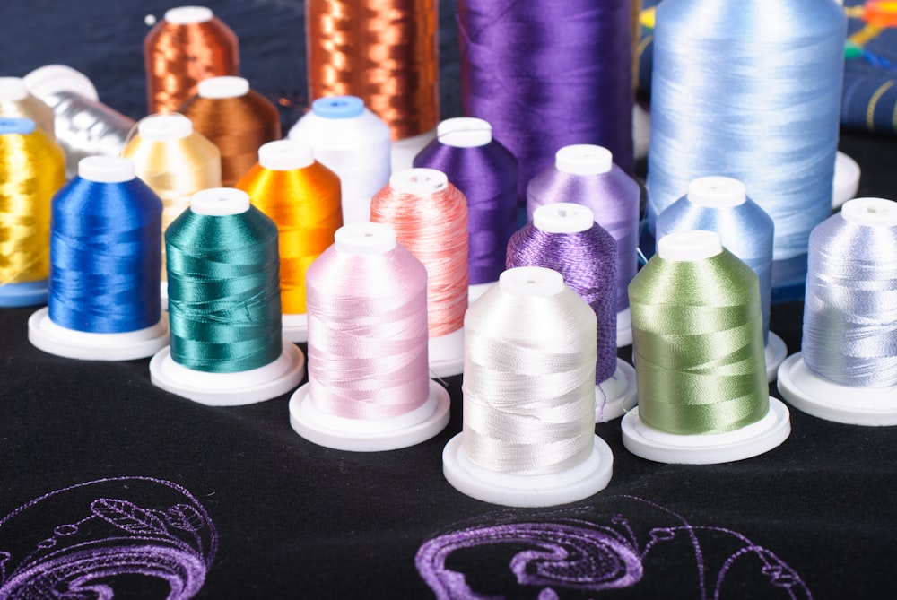 a group of vases are lined up on a table